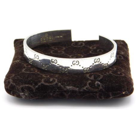 A Gucci silver bangle with soft bag, 59mm internal diameter, 27g 