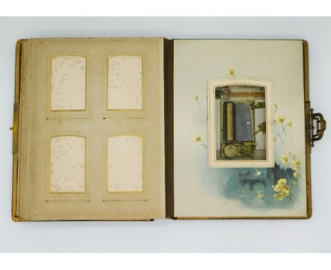 A 19thC. musical portrait album with Swiss movement &amp; various portraits