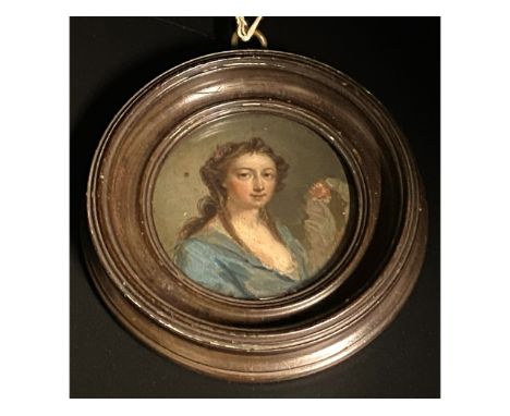 In the style of George Engleheart (1750-1829), a miniature watercolour portrait of a lady in dark blue dress. Image size 52mm