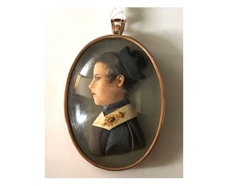 An Italian school, early 19thC. coloured wax miniature portrait plaque of a novitiate monk, of Royal birth wearing the Order 