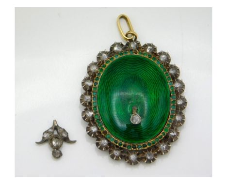 A 19thC. gold &amp; silver guilloche enamelled locket pendant set with diamonds &amp; cabochon cut green stones (possibly eme