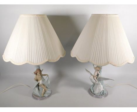 Two Lladro porcelain figurative lamp bases with matching shades, 25.5in tall inclusive
