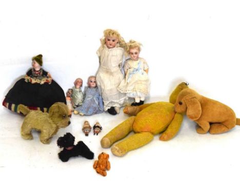 Quantity of vintage toys to include; golden mohair teddy bear, bisque-headed dolls (tallest 39cm), etc.