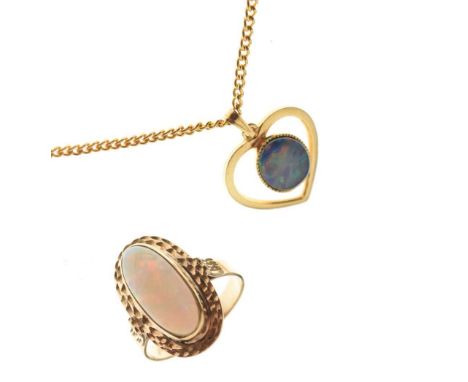 '9ct' gold opal set ring, size Q, 4.3g gross approx, and an unmarked yellow metal heart-shaped pendant set 'opal'-effect doub