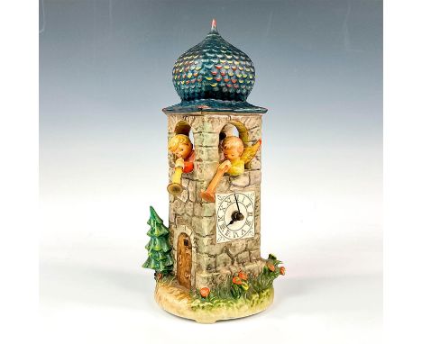 Beautiful piece featuring two angels with trumpets in the windows of the chapel with a small clock on the front. Part of M.I.