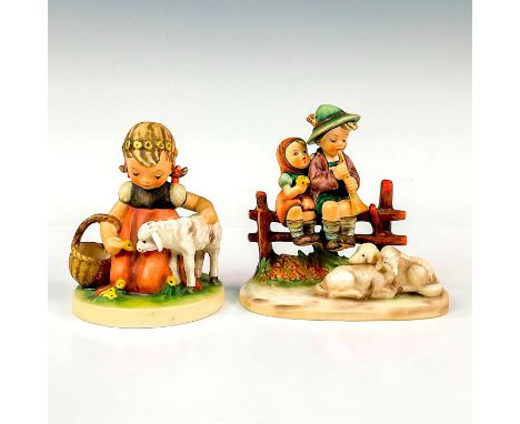 Two porcelain figurines, one depicting a young girl feeding a lamb a bushel of vegetables, and the other two children sitting