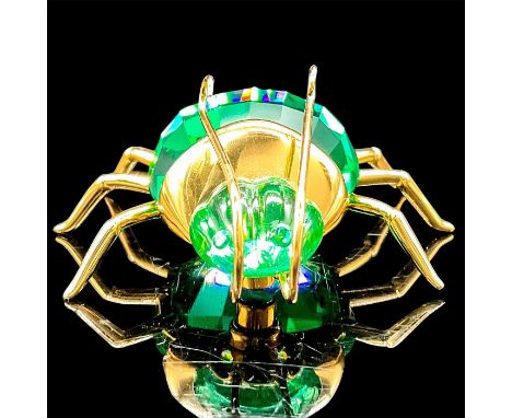 Part of the Daniel Swarovski Paradise Insects and Butterflies collection. Light emerald crystal large beetle decorated with g