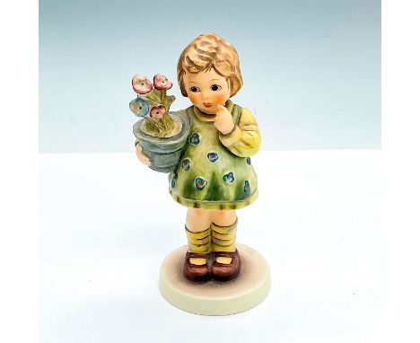 Young girl with a flower pot. Matte finish. Goebel backstamp and 463/0 item number imprint. M.I. Hummel Club Exclusive Editio