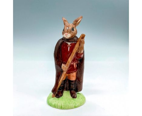 Brown cloak, maroon tunic, and tan trousers. Royal Doulton backstamp. Artist: M. AlcockIssued: 2001 - 2003Dimensions: 2.5"L x