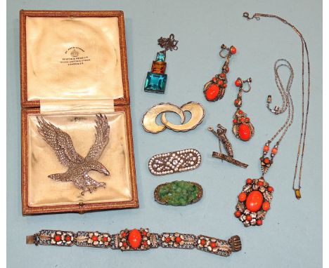 An Ivar Holth Norwegian silver and cream enamel brooch, (a/f, enamel repaired), a marcasite-set silver eagle brooch, a Miriam