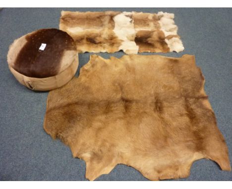 Taxidermy - Deer skin rug L138cm, fur throw L135cm and a circular pouffe D55cm