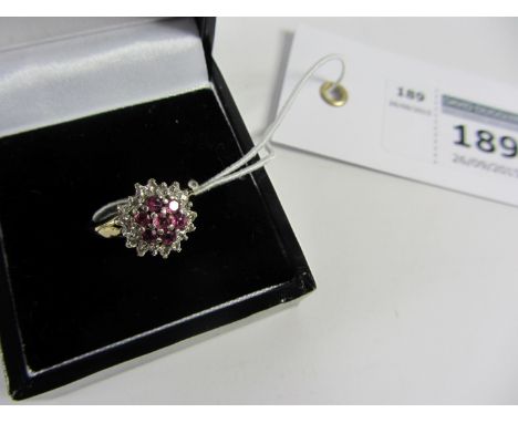 Ruby and diamond cluster ring hallmarked 9ct