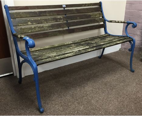 Cast iron and wood slatted garden bench, W129cm