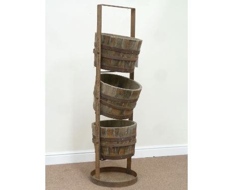 Three tier metal barrel planter stand and three wood and metal bound planters, H154cm