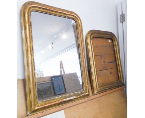 A 19th century gilt-framed looking glass with decorative bead edging (approx. 52 x 70 cm) and a smaller similar frame without