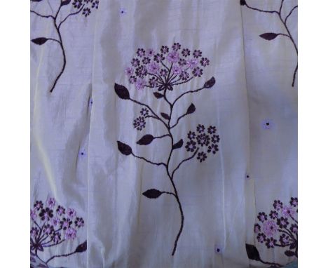 A pair of lavender and gold shot silk-effect curtains embroidered with sprigs of flowers; triple pinch pleat heading, cream c
