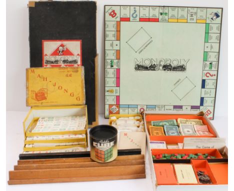 Three 20th century games: 1. a 1930s Monopoly set (PAT. APP. For No. 3796-36). 2. an early to mid 20th century Chinese mahjon