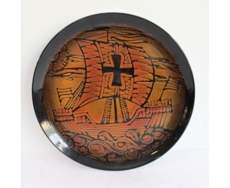A wall-hanging Poole Pottery charger in the Aegean pattern (32.25 cm in diameter)