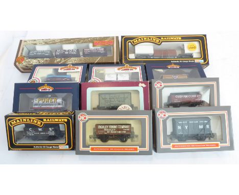 A collection of 11 boxed 00 gauge model railway wagons, to include: a set of three Coal Trader Classics (West Country) by Bac