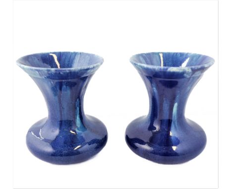 A pair of Art Deco period Pilkingtons 'Lancastrian' blue-glaze ceramic vases: squat spherical form and with wide waisted neck