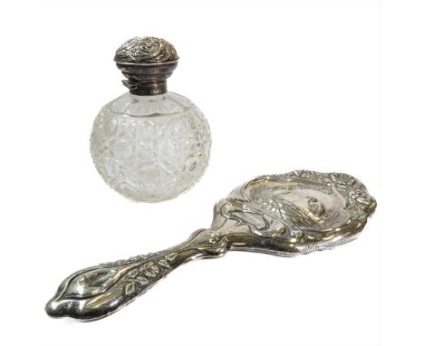 Two dressing-table requisites: 1. a 19th century spherical cut-glass scent bottle with hinged silver lid. 2. a late 19th cent