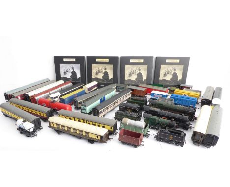 A large collection of unboxed, used 00 gauge model locomotives, coaches and rolling stock, along with four boxed DeAgostini 1