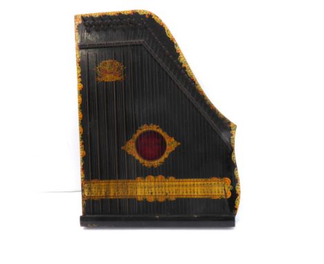 A circa 1900 century guitar zither marked 'Menzenhauer's American&nbsp;Guitar Zither - Patented - Brevete'&nbsp;(55 cm high x