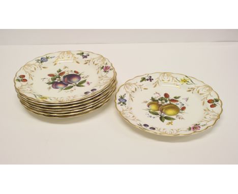 A set of eight Royal Worcester dessert plates, centres and borders decorated fruit
