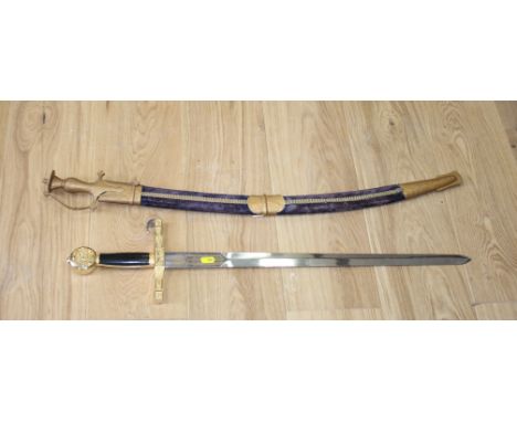 A model of King Arthur's sword "Excalibur", 31" long, and a tulwar in velveteen scabbard