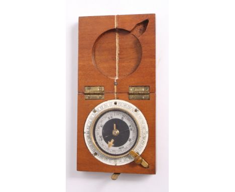 A compass in square mahogany case