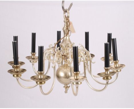 A Cromwellian style silvered metal pendant centre light fitted ten lights on scroll decorated arms