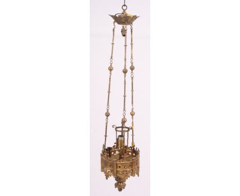 A gilt metal pendant centre light in the manner of Pugin, the circular frame pierced and cast quatrefoils and scrolls, hung f