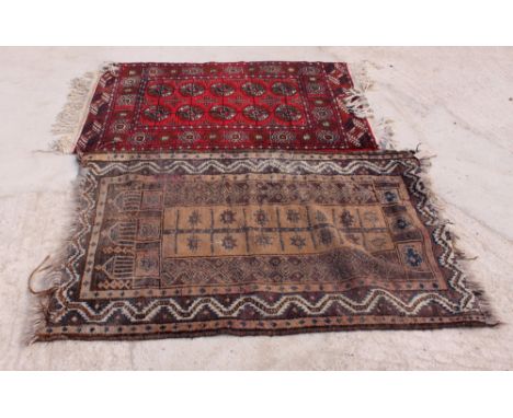 A Turkish prayer rug decorated stylised tree on a light brown ground with three border stripes, 50" x 35" approx, and a moder