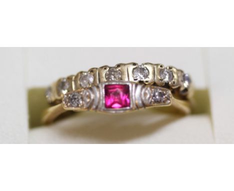 An 18ct gold, ruby and diamond set dress ring and a 9ct gold and diamond set dress ring