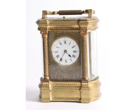 A 19th Century French brass cased repeater carriage clock with white enamel dial and Roman and Arabic numerals, the case stam