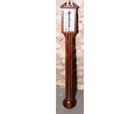 A Georgian design stick barometer in mahogany case