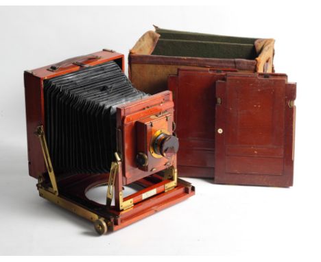 A Thornton Pickard mahogany and brass field camera, 6 1/2" x 4 3/4", with Aldis Uno astigmatic +7.7 lens, in case 