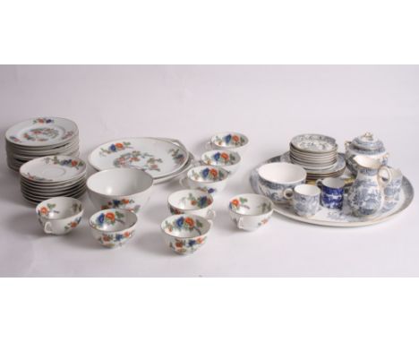 A Royal Worcester china Willow pattern part cabaret set including a circular tray and a continental china teaset decorated or