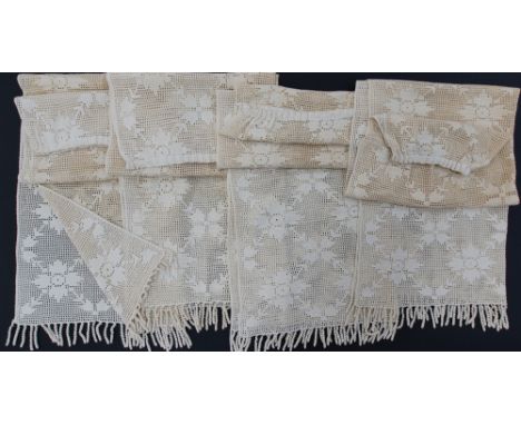 A Cypriot set of four hand crocheted curtains H175cm, W110cm with a fringe hem. (4)