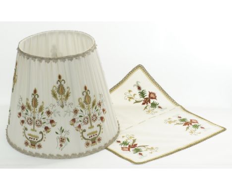 A vintage organza hand embroidered lamp shade H32cm, together with a matching embroidered table mat 45x40cm. (2)
