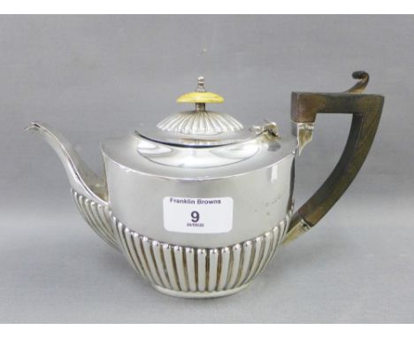 Edwardian silver teapot, with half fluted decoration, ivory finial and ebony handle, Birmingham 1909, 14cm high  