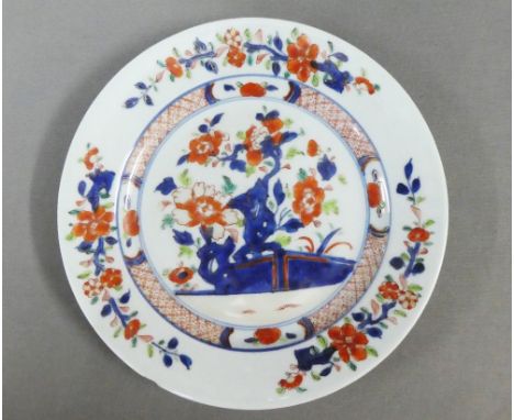 Chinese plate painted with underglaze blue foliage pattern, (small chip to rim) 23cm diameter  
