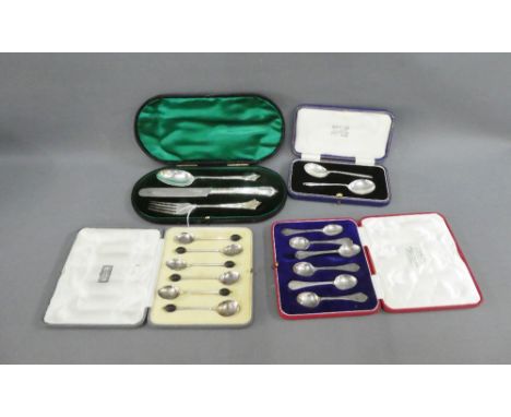 George V silver knife, fork and spoon set, Sheffield 1928 together with three sets of six silver teaspoons, all in fitted cas