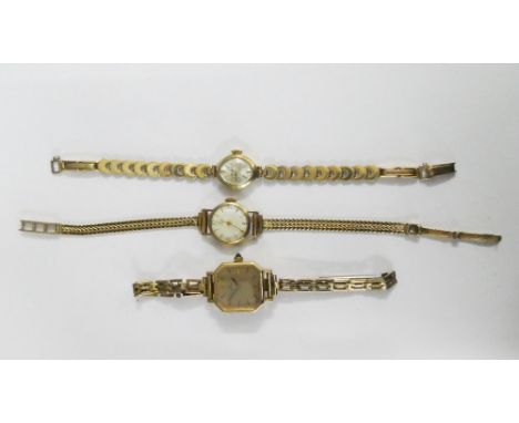 A collection of three  lady's vintage wristwatches to include Tissot on a 9ct gold bracelet strap, 9ct gold cased Titus and a