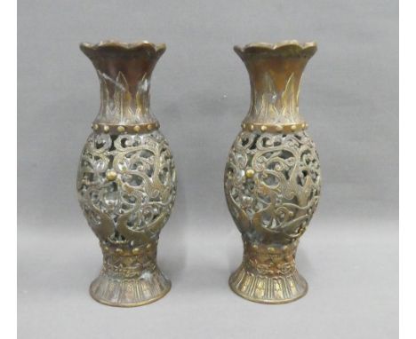 Pair of Japanese bronze vases pierced with dragon pattern, 21cm high (2) 