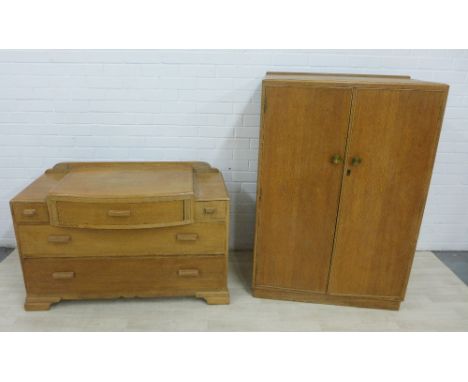Early 20th century light oak chest of drawers and a two door Austinsuite wardrobe, 124 x 85cm (2) 