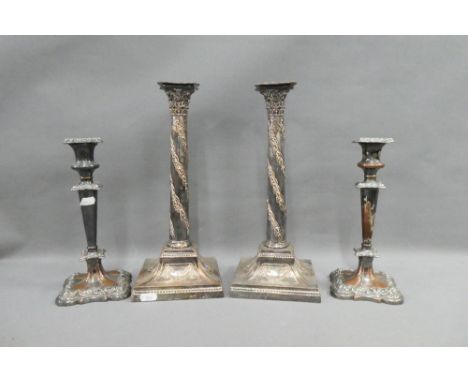Pair of silver plate on copper candlesticks together with a smaller pair, tallest 34cm (4) 
