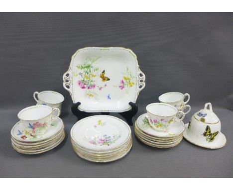 Royal Worcester teaset handpainted with butterflies and flowers, comprising six cups, twelve saucers, six side plates, cake p