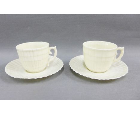 Pair of Belleek porcelain cups and saucers, with green Fermanagh backstamp (4) 