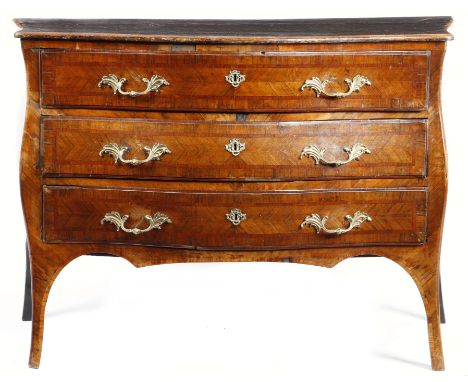 An 18th century continental walnut serpentine commode, the later top above three crossbanded long drawers with book matched v